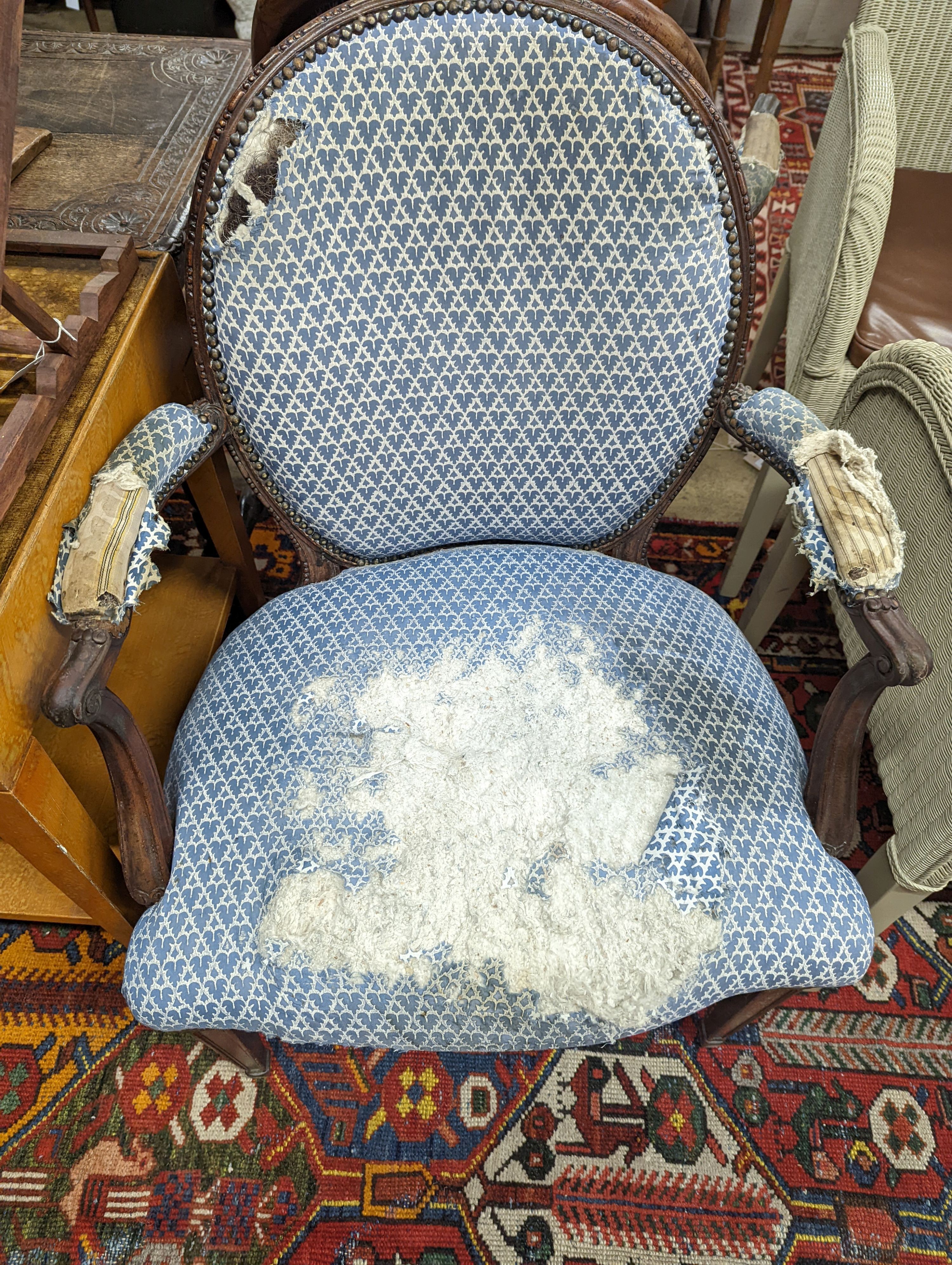 A pair of George III Hepplewhite style mahogany open armchairs, width 64cm, depth 50cm, height 92cm